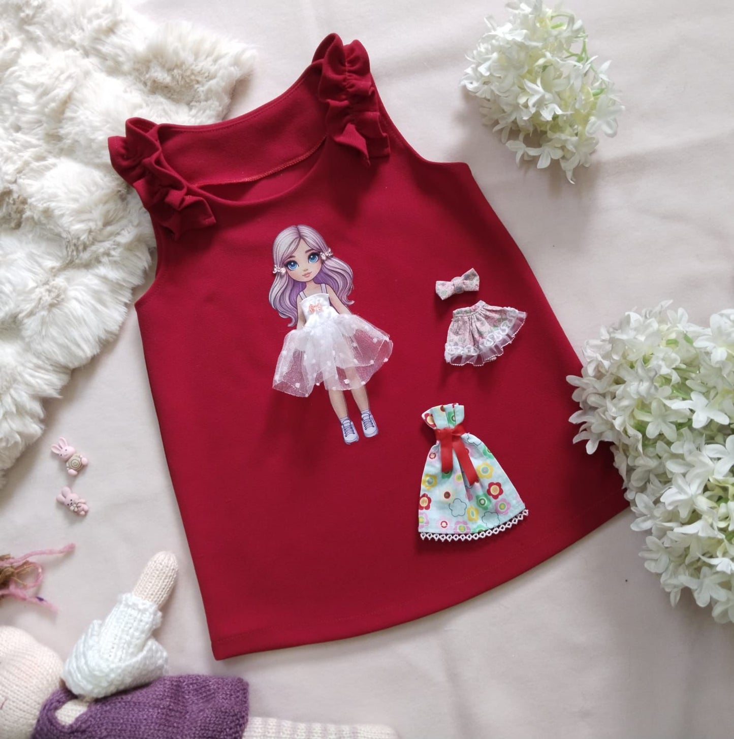 Ropa con muñeca